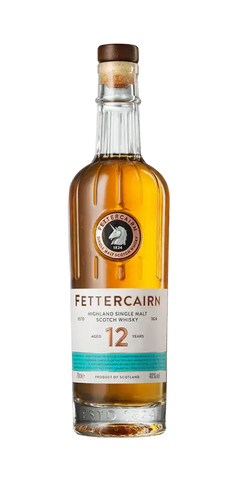 Schottischer Whisky Fettercairn 12 Jahre, Single Malt aus den Highlands, in klarer Flasche mit bernsteinhoniger Farbe.