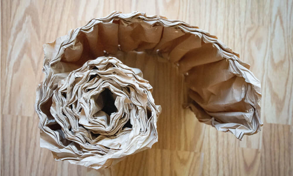 Sichere Lieferung: Rollen aus umweltfreundlichem Karton für den Verpackungsschutz von TIME 2 TASTE.