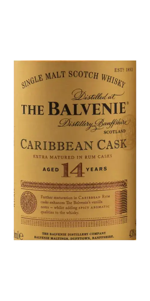 Schottischer Whisky Balvenie Caribbean Cask, 14 Jahre, in Rumfässern gereift, goldene Flasche mit Etikett aus Schottland.