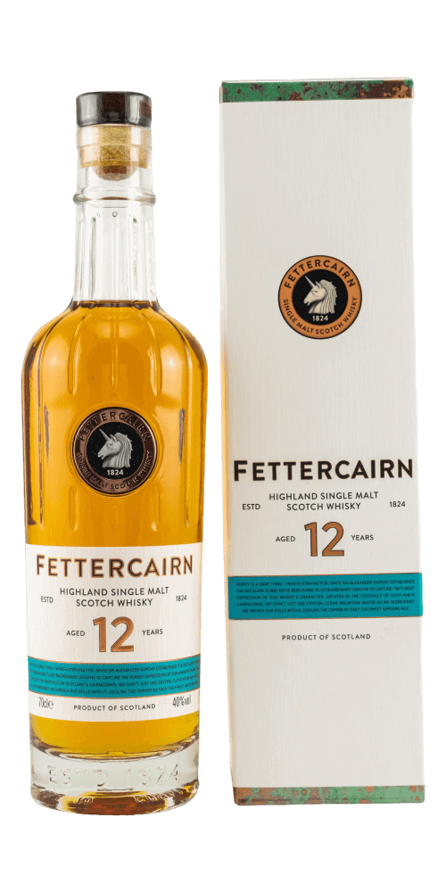 Schottischer Whisky Fettercairn 12 Jahre, Highland Single Malt in edler Verpackung, mit bernsteinhoniger Farbe.